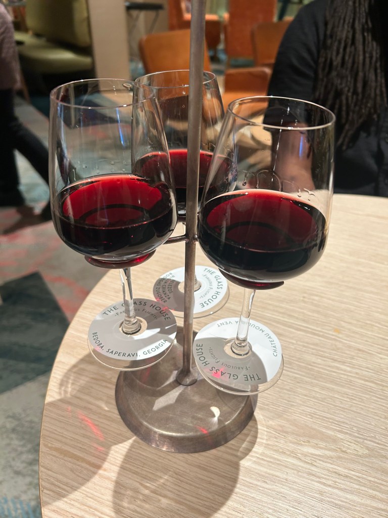 Wine flight of fine reds at The Glass House restaurant on P&O Azura