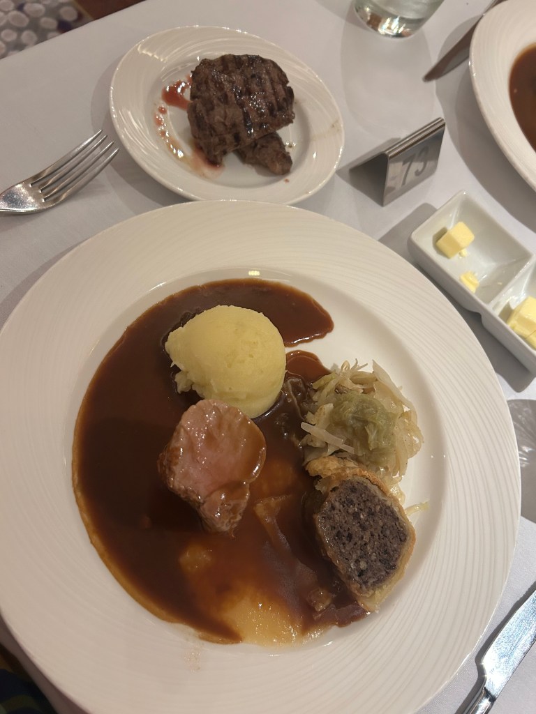Main course in main dining room on Black Tie celebration night