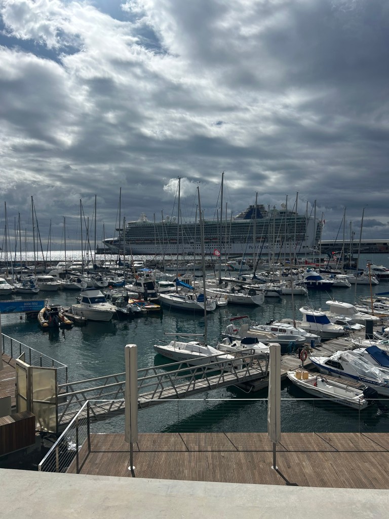 P&O Azura in the back drop of a marina in Funchal