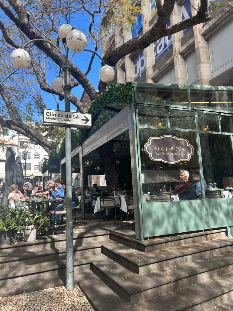 Café Funchal, a very unique restaurant in old town with a free growing through the roof of the outdoor patio
