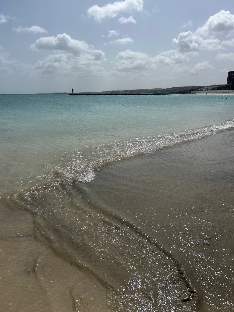 The beach next the ship in port of Puerto del Rosario, Fuerteventura